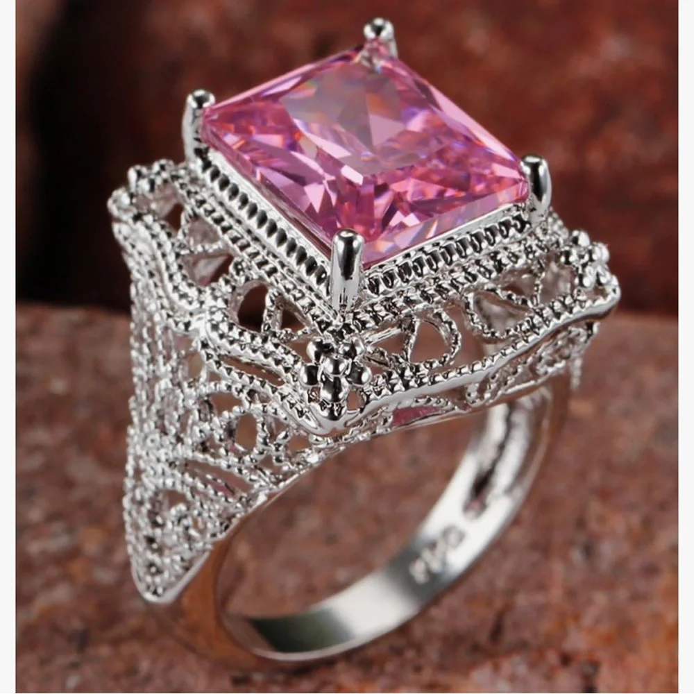Intricate Silver Ring with Pink Gemstone - Picture 2 of 3